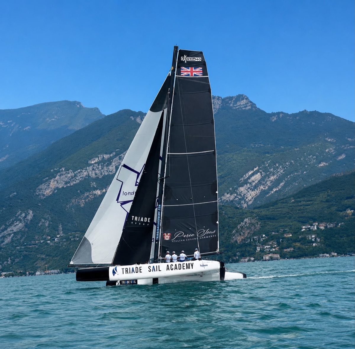 The Triade Sail Academy catamaran with its Parea Sons mainsail, on Lake Garda.
